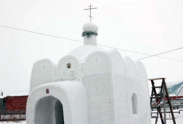 In this image made from video, a chapel made of snow is seen in Sosnovka, Russia, Wednesday, Feb. 8, 2017. Sosnovka resident Alexander Batyokhtin has built a church in this village in Siberia made entirely of snow. Batyokhtin was constructing the chapel each day for nearly two months even temperatures plunged below minus 30 degrees Celsius (-22 Fahrenheit). He used 12 cubic metres (424 cubic feet) of snow to make it in the village in the Omsk region. (AP Photo)