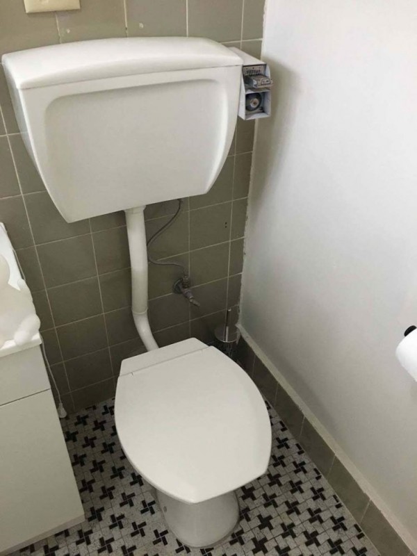 World's stingiest landlord installs a COIN OPERATED toilet that prevents tenants from flushing unless they insert a dollar (detroyon/imgur)