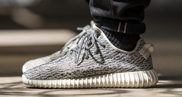 Guy Buys Limited Edition Yeezy Snickers Receives Cute