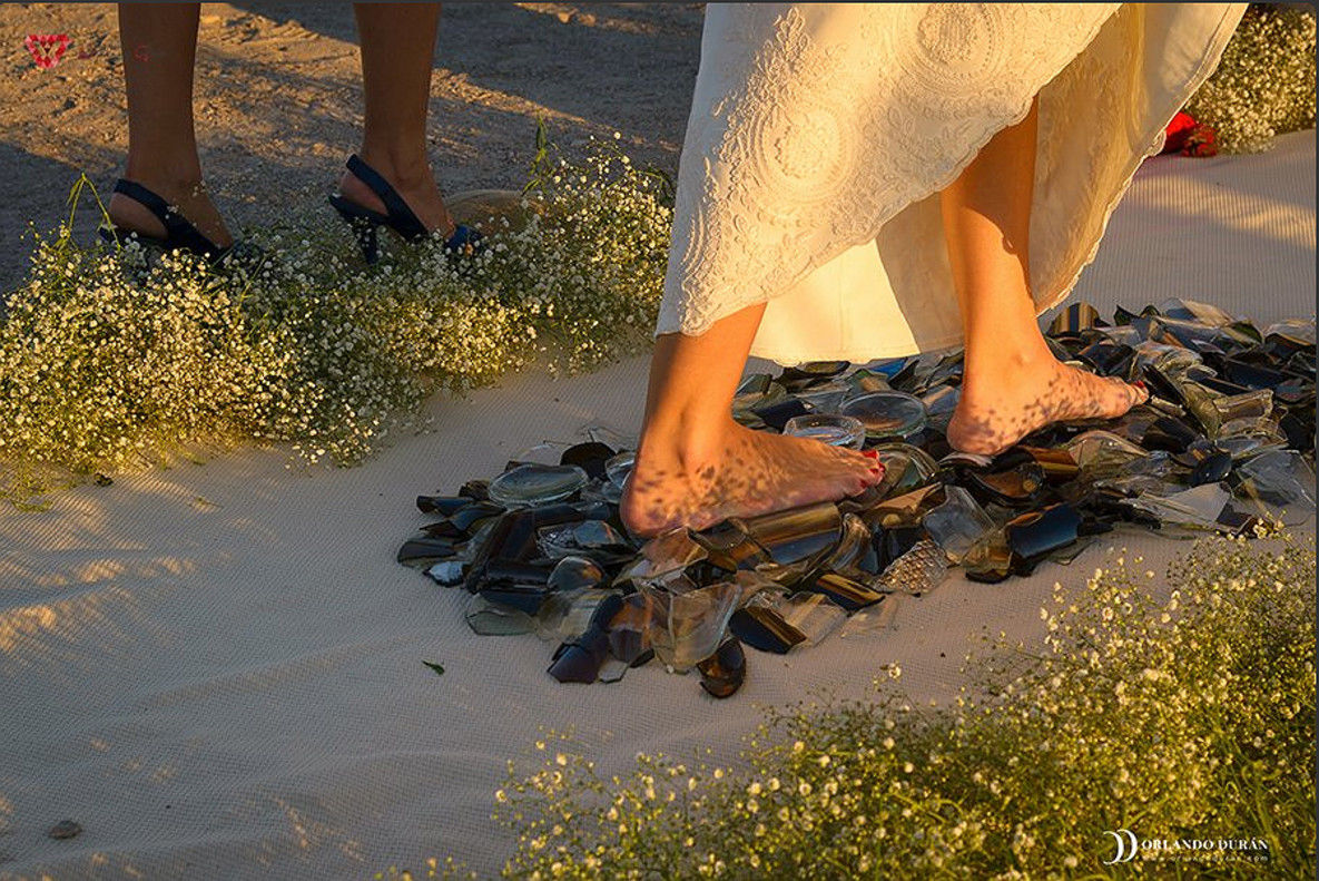 New Service Has Couples Walking Barefoot on Broken Glass on Their