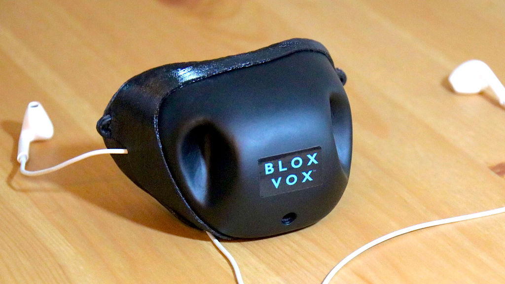 BloxVox A BaneLike Mask That Muffles Speech for Private Phone Calls