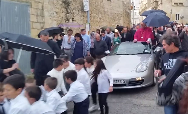Maltese City Welcomes Archbishop In Porsche Sports Car Pulled By Children