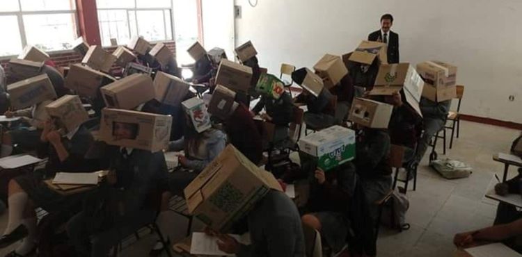Teacher Sparks Controversy for Making Students Wear Cardboard Boxes to Deter Cheating on Exam
