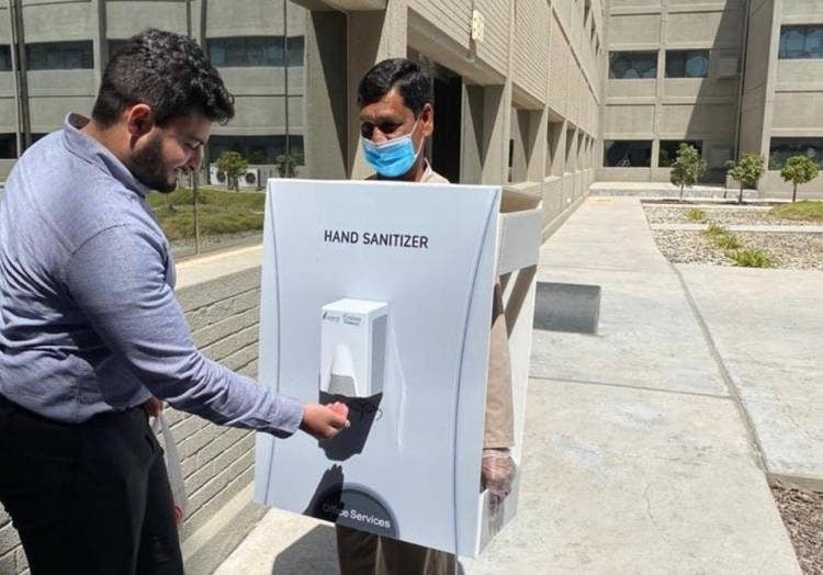 Saudi company in hot water after using employee as human hand sanitizer stand