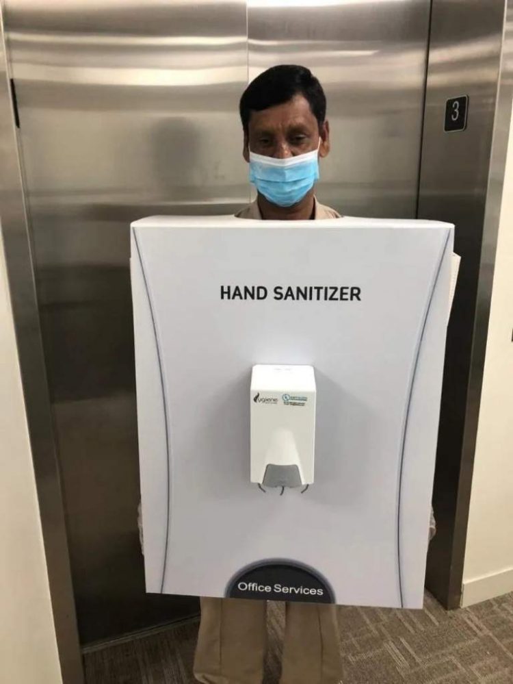 Saudi company in hot water after using employee as human hand sanitizer stand