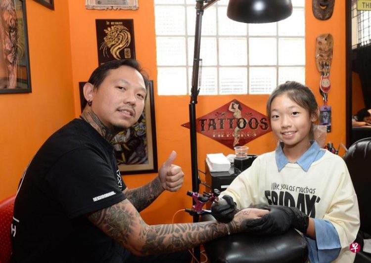 Would You Let Yourself Be Tattooed by This 13-Year-Old Girl?