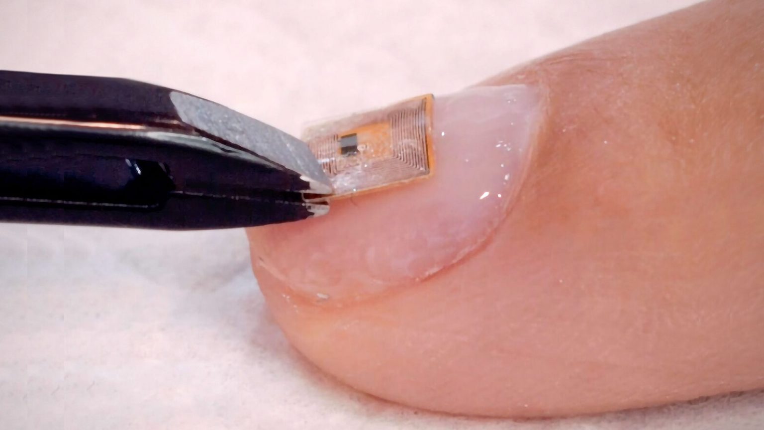 Microchip Manicure Turns Your Nails into Digital Business Cards