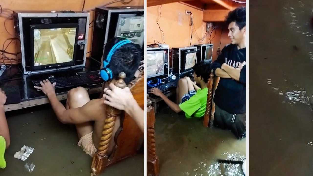 Hardcore Gamers Continue Playing in Flooded Internet Cafe