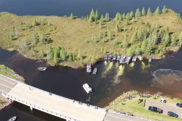 The Giant Floating Island of Lake Chippewa Has to Be Pushed by