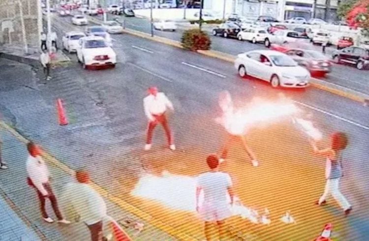 Fire Breather Battles Mexican Mariachi in the World’s Most Bizarre Street Fight